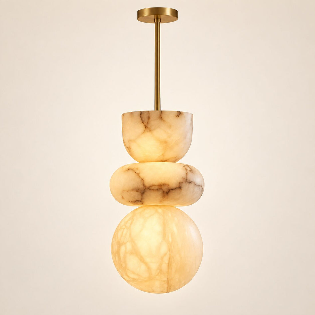 Alverra Alabaster Pendant Light on a warm neutral background