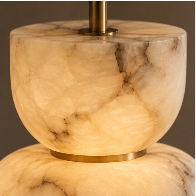 Close view of natural alabaster veining and brass