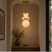 Alverra pendant lighting an entrance niche