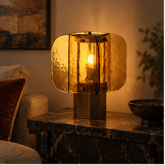 Amber glass lamp on a marble side table