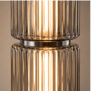 Close view of fluted smoke glass and nickel joint