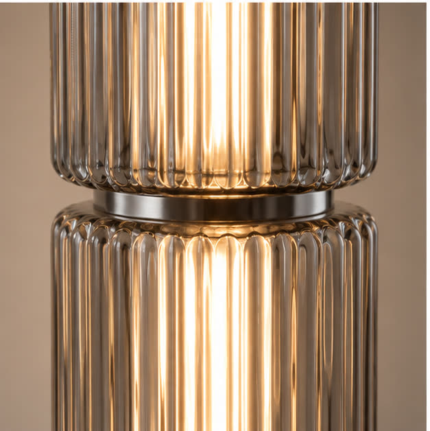 Close view of fluted smoke glass and nickel joint