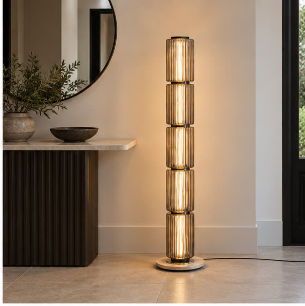 Astra floor lamp beside an entrance console