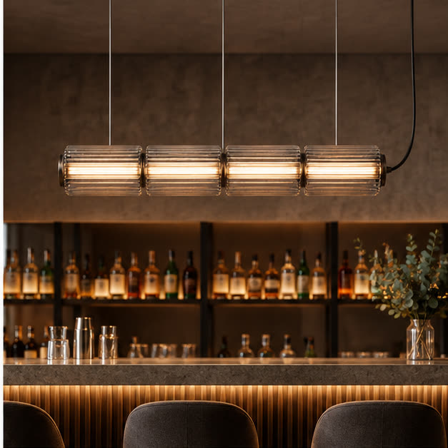 Smoke-grey Astra pendant above a hospitality bar