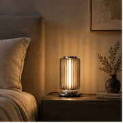 Small Astra table lamp on a bedside table