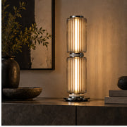 Medium Astra table lamp on a living-room console