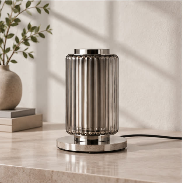 Astra grey glass table lamp in daylight, switched off