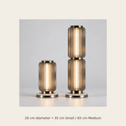 Astra table lamp dimensions: 20 centimetres diameter and 35 or 65 centimetres high