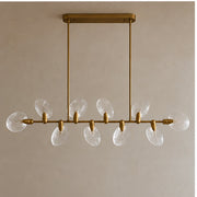 Atelier Velmora glass and gold frame in daylight, switched off