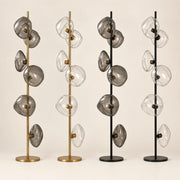 Auralis Glass Floor Lamp in all four metal and glass finish combinations