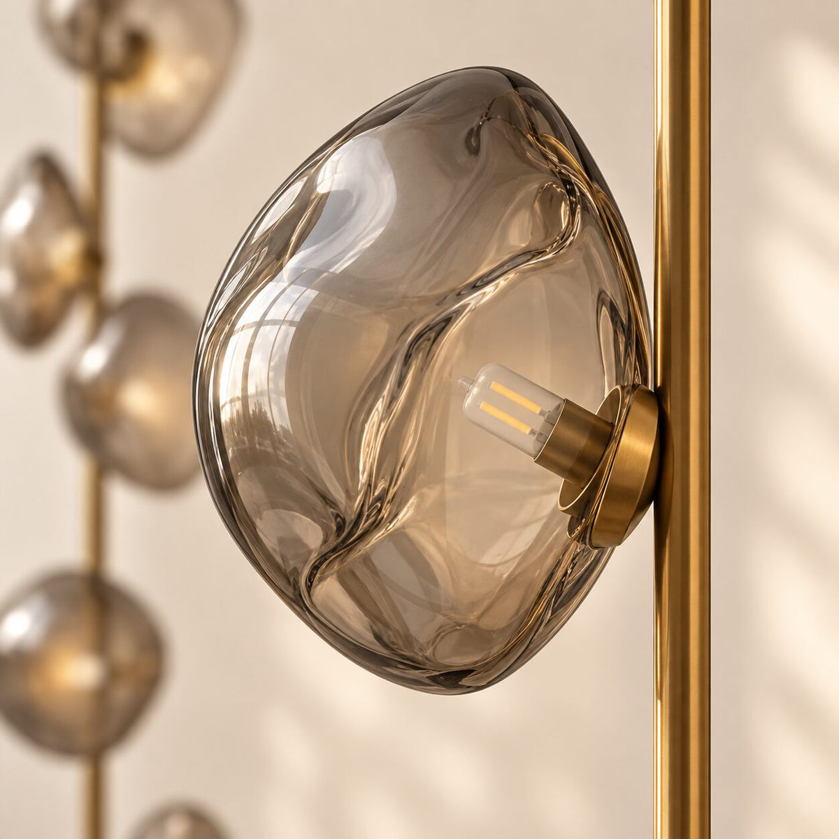 Close detail of Auralis handcrafted glass shade and G9 LED mount