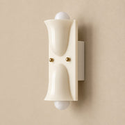 Side profile of the beige Auralis wall lamp
