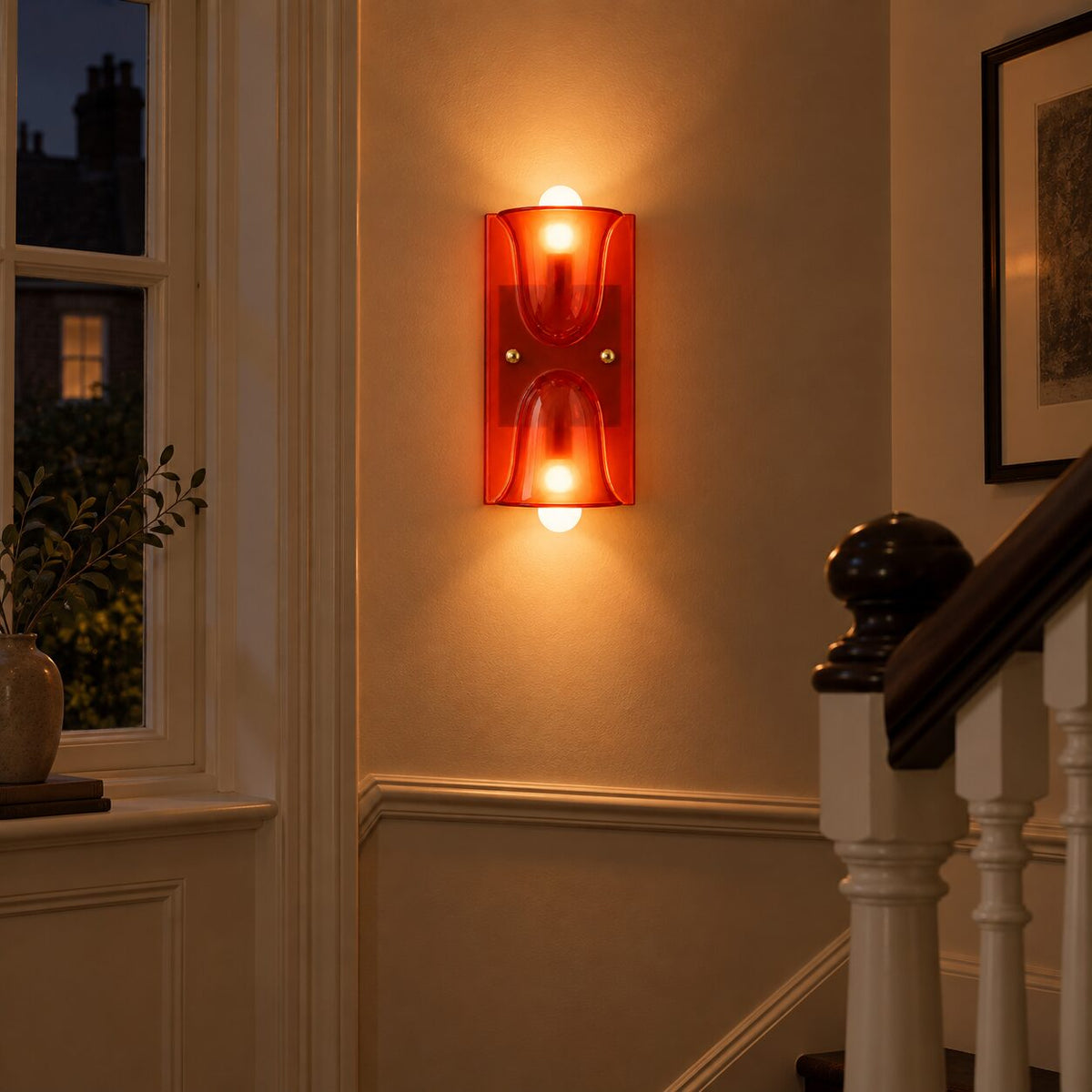 Amber Auralis wall lamp casting up and down light