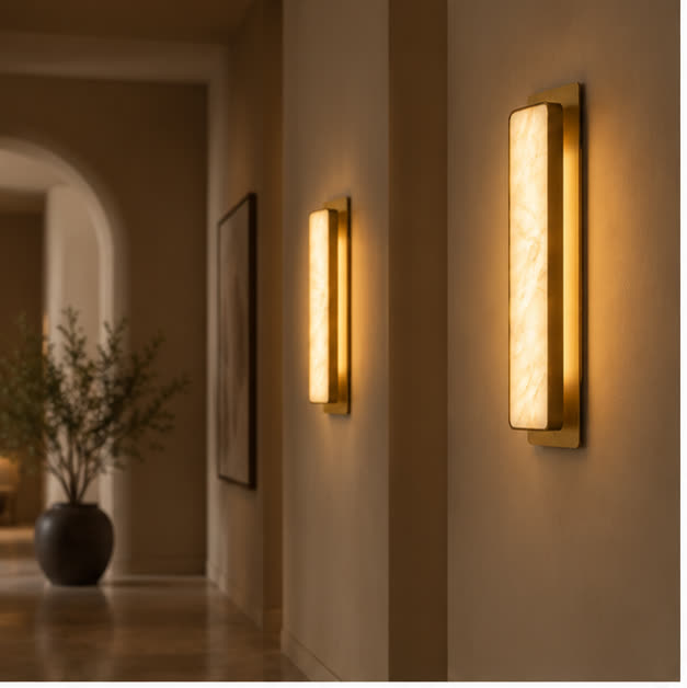 Pair of Auralis marble wall lights in a hallway
