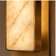 Natural marble veining and brushed brass edge detail