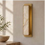 Auralis marble wall light in daylight, switched off