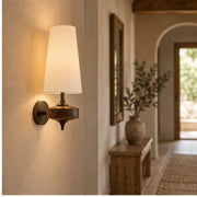 Auralis white fabric wall light in a hallway