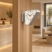 Silver Aurelian clock in a boutique hospitality passage