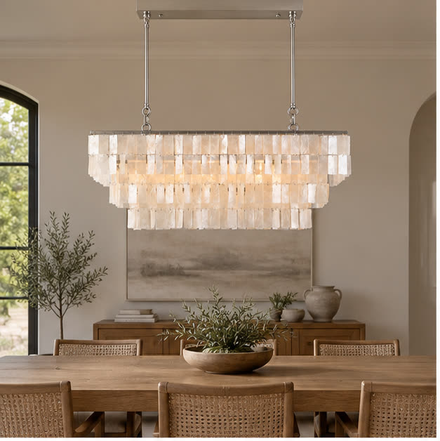 Capri linear shell chandelier above an oak dining table