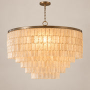 Capri round natural shell chandelier on a warm neutral background