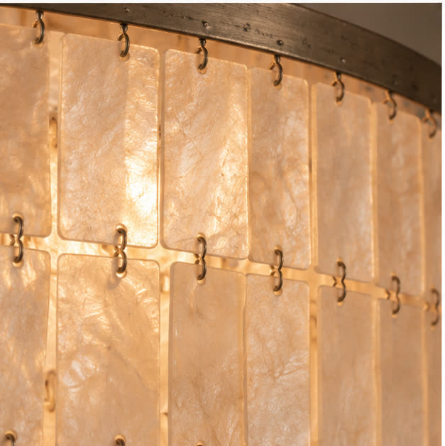 Close view of natural shell panels and metal links
