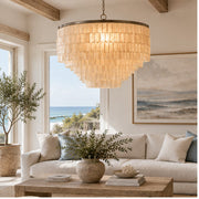 Capri shell chandelier in an airy coastal living room