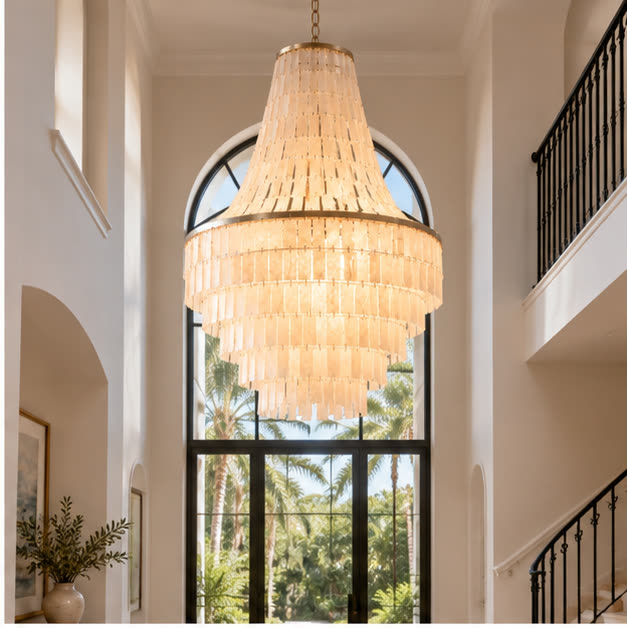 Capri tiered shell chandelier in a double-height foyer