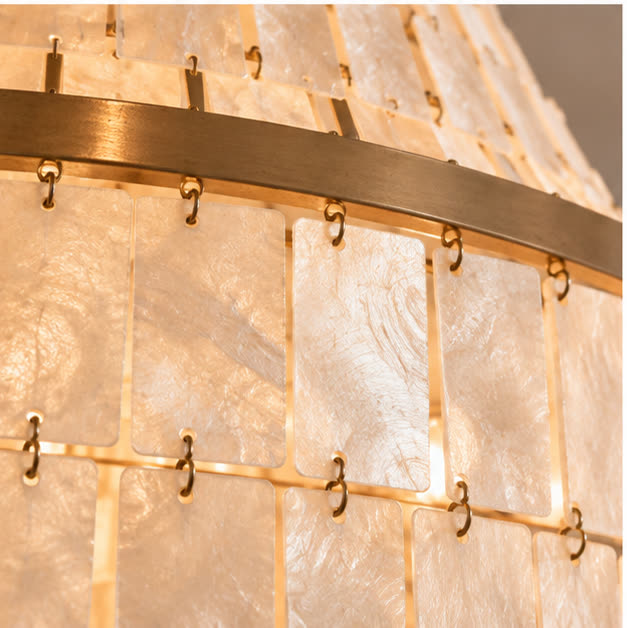 Close view of natural shell panels and metal links