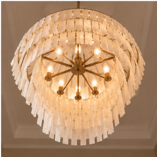 Low-angle view of the eight-light chandelier interior