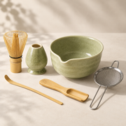 Chado six-piece matcha set in celadon green on a warm ivory background