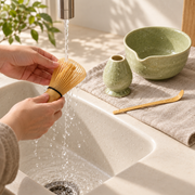 Hand-rinsing the Chado bamboo whisk and air-drying the ceramics