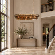 Étoile chandelier in a double-height entrance