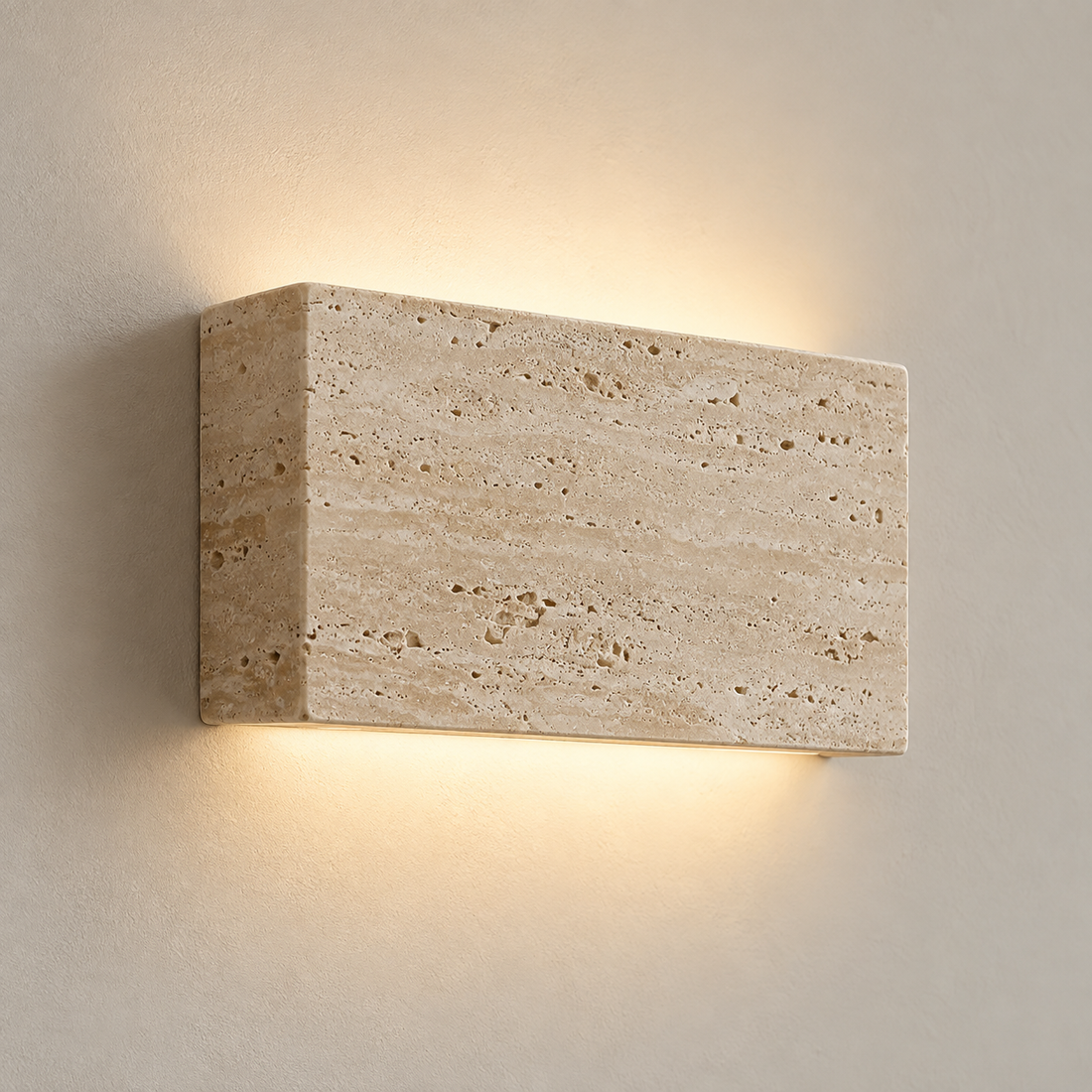 EveryHaven Lumo natural travertine wall light, warm up-and-down glow