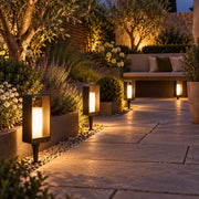 Warm LumoEdge lights in a compact courtyard