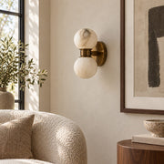 Lunara marble wall lamp in a daylight living room