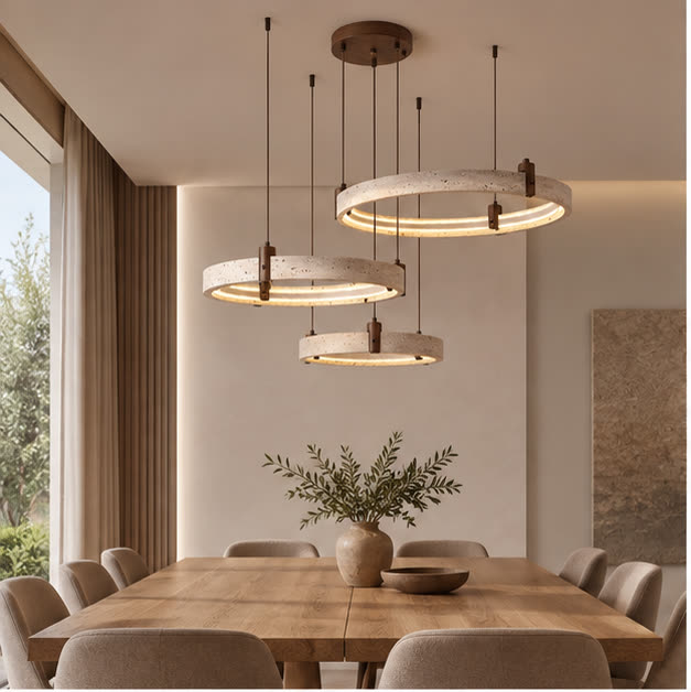 Three-ring TerraStone pendant above an oak dining table
