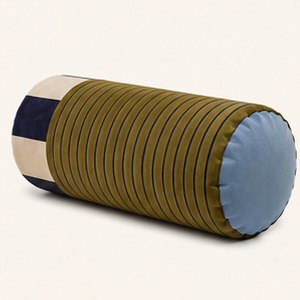 Sovana velvet neck-roll pillow in Olive Navy on a cream background